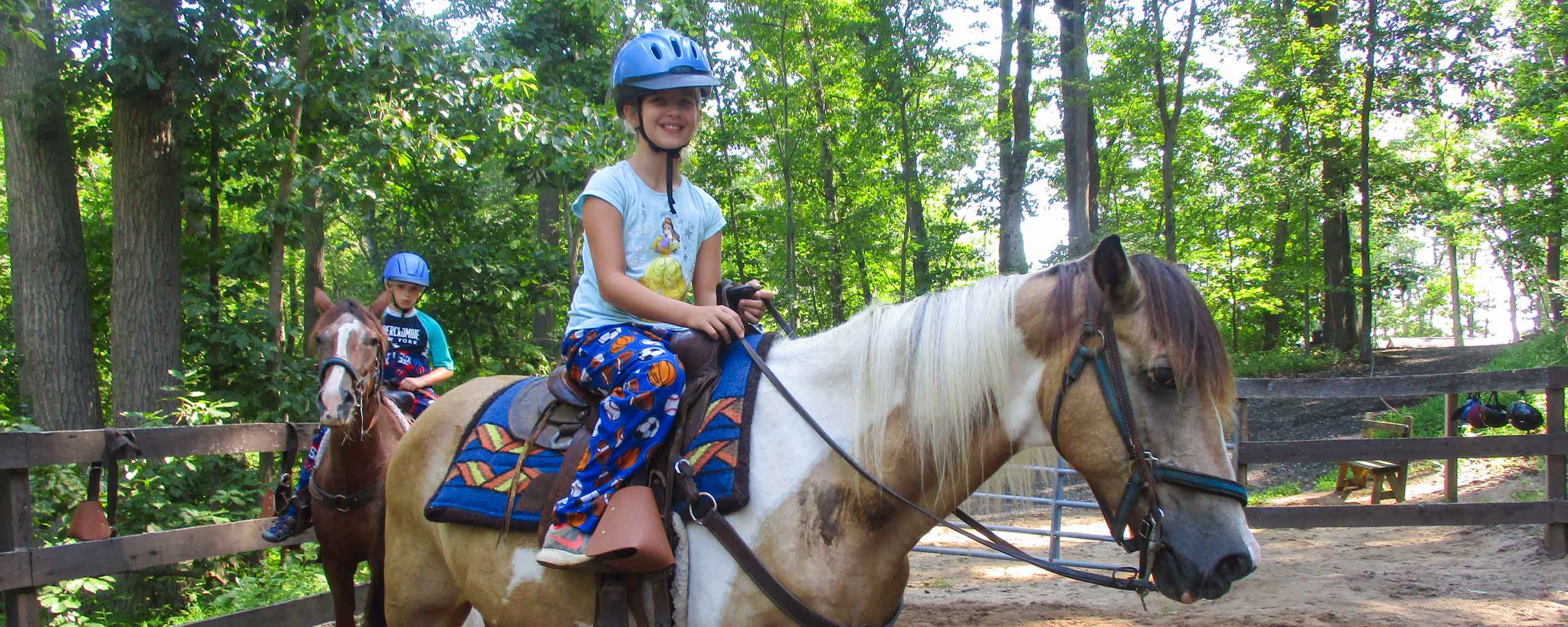 Campers horseback riding